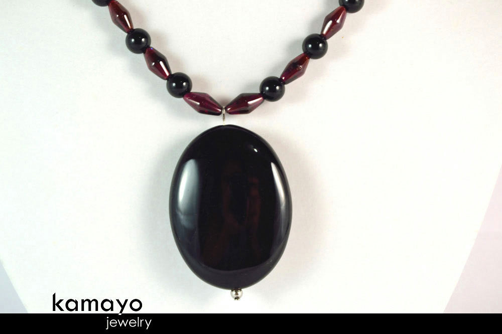 CAPRICORN NECKLACE - Black Onyx Pendant and Red Garnet Beads