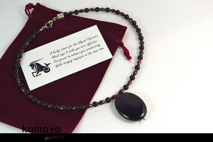 CAPRICORN NECKLACE - Black Onyx Pendant and Red Garnet Beads