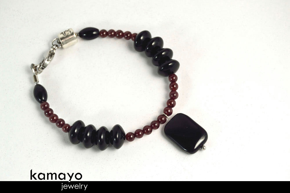 CAPRICORN BRACELET - Black Onyx Pendant and Red Garnet Beads